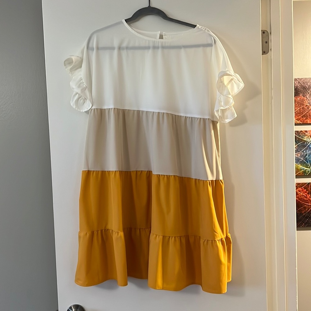 Ruffle dress, cream, tan, dark yellow.